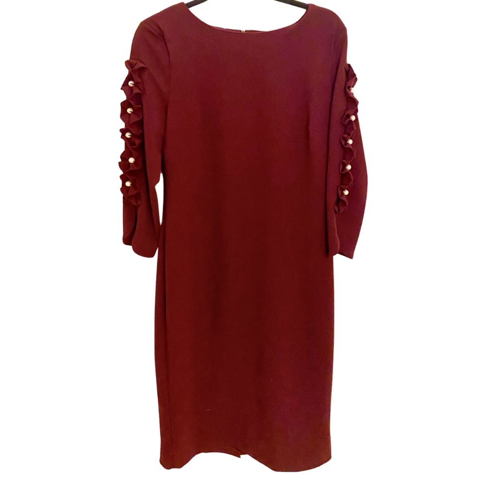 Beautiful Burgundy Dress with Ruffles and Pearls on the sleeve by ECI